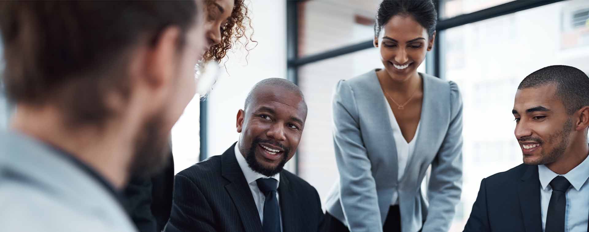 A Group of businesspeople having a meeting in the boardroom