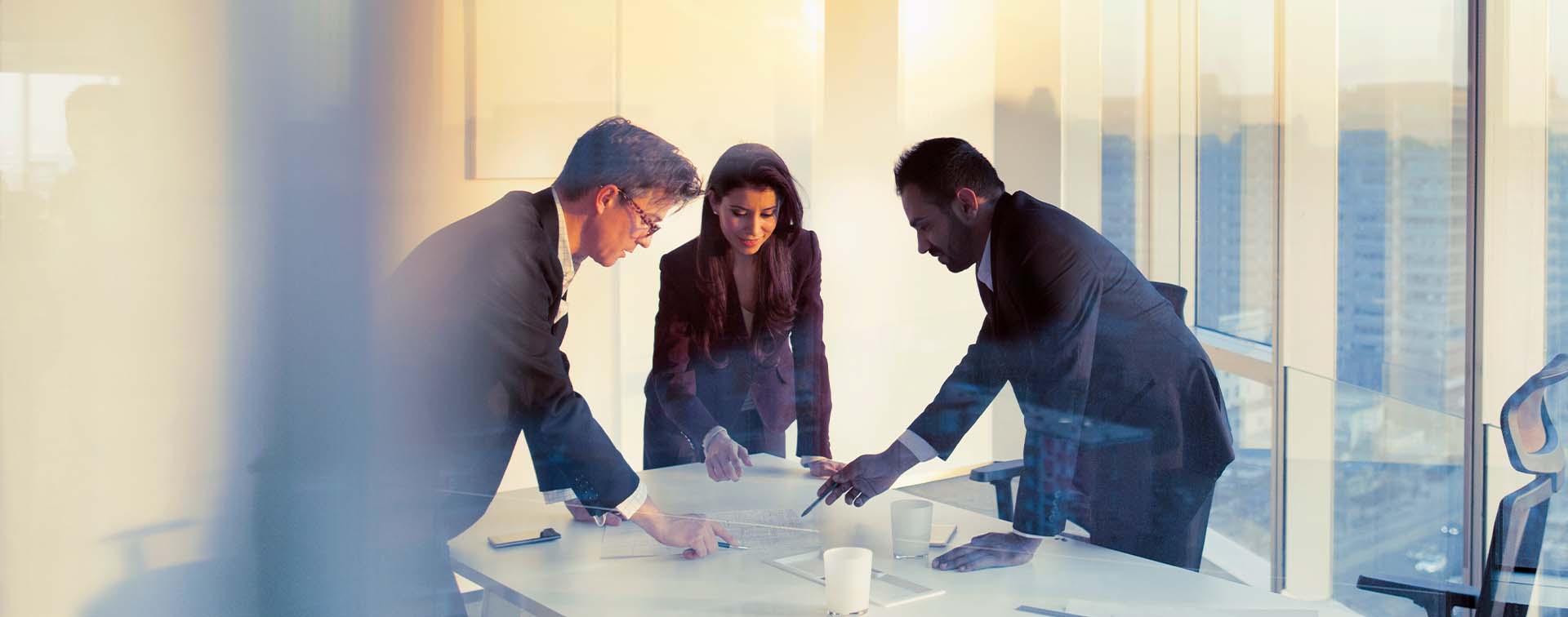 Business colleagues planning together in meeting