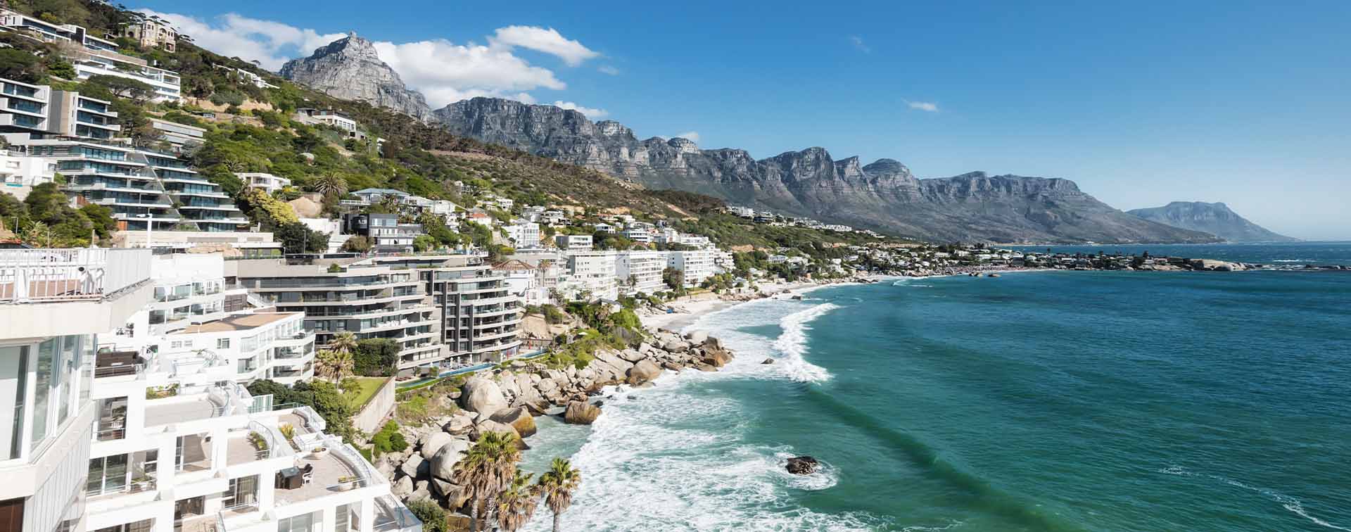 Camps Bay Cape Town with Twelve Apostles in the background.