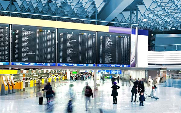 Modern Airport with people moving through it