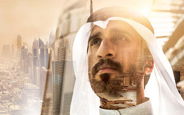 Businessman posing the city of Dubai, UAE